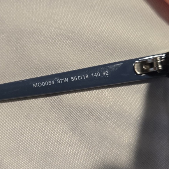 MAX&CO SUNWEAR
MO0084 87W - SHINY TURQUOISE / SHINY LIGHT BLUE Size: 55:18:140MM - Picture 11 of 11